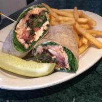 Salmon Wrap · With spinach, tomato, bacon, and mayonnaise in a whole wheat tortilla served with french fri...