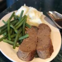 Heated Sliced Meatloaf with Au Jus · Served with Mashed Potatoes & Vegetable of the Day