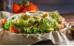 Garden Salad · Crisp lettuce, tomato, cucumbers, onions, croutons, cheddar Jack cheese and balsamic vinaigr...