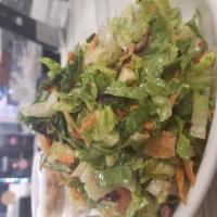 Fattoush Salad · Crisp romaine lettuce, cucumbers, tomato, shredded red cabbage, shredded carrots mixed with ...