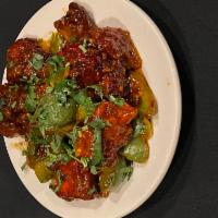 Chicken Chili · Boneless meat is deep-fried to a crisp and sauteed with onions and green bell peppers with m...