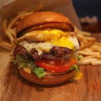 Craft Classic Burger · 1/3 lb. Ground Certified Hereford Beef (CHB) , American cheese, pickles, onion, romaine hear...