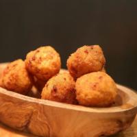 Mac and Cheese Fritters · Crispy shelled mac and cheese.