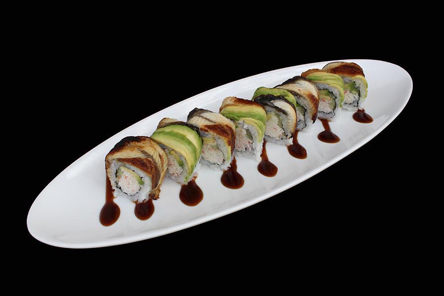 Dragon Roll · Crab mix, cucumber, avocado topped with eel, avocado, and eel sauce.