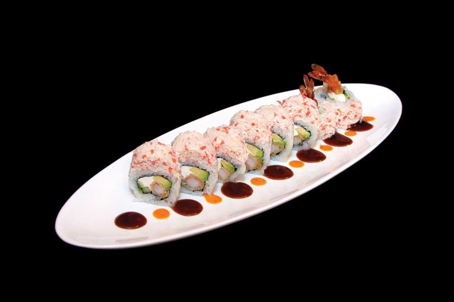 Long Horn Roll · Shrimp tempura, cucumber, avocado, cream cheese topped with crab mix and eel sauce, spicy mayo.
