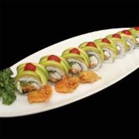 Godzilla Roll · Spicy crab mix, cream cheese, jalapeno topped with avocado, deep-fried crawfish and hot sauce.