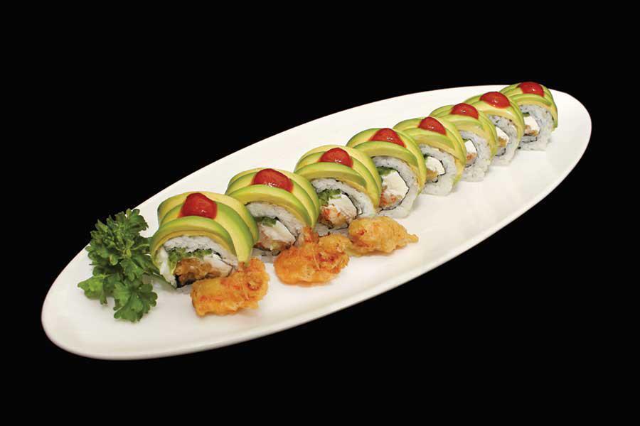 Godzilla Roll · Spicy crab mix, cream cheese, jalapeno topped with avocado, deep-fried crawfish and hot sauce.