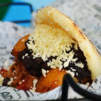 Arepa Pabellon · Shredded Meat, Black Beans, White Cheese AND sweet plantains...