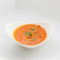 Chana Paneer Masala · Whole chickpeas, homemade cheese with fresh garlic and ginger cooked in creamy tomato sauce.