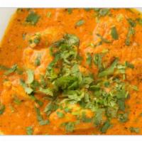 Chicken Curry · Boneless chicken cooked in curry sauce with Indian herbs and spices.