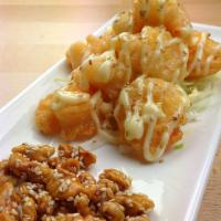 25. Walnut Shrimp 合桃蝦球 · Sesame gentle heat caramelized walnut batter coated deep-fried shrimp Japanese mayo.