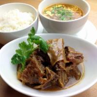 52. Braised Brisket Set meal 柱候牛腩定食 · Summering point half in spices fermented bean paste garlic shallot puree beef brisket.