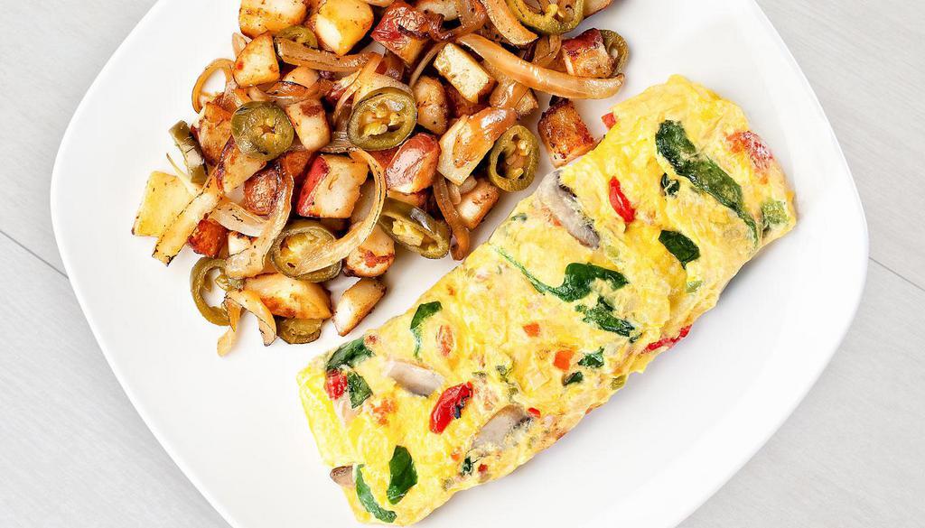 Very Veggie Omelette · Fresh spinach, bell peppers, onions, mushrooms, roasted red peppers, tomatoes, garlic seasoning and Jack cheese. Vegetarian.