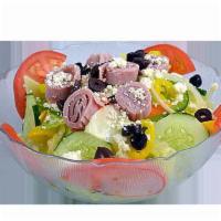 Larry's Famous Greek Salad · Garden salad topped with feta cheese, Greek olives, premium ham, pepperoncinis and our own G...