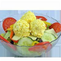 Egg Salad · Garden salad topped with egg blended with Hellmann's real mayonnaise.