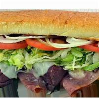 Mighty Mitch Sub · Premium ham, all natural USDA choice roast beef and melted provolone.