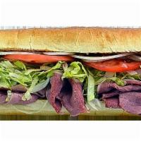 Corned Beef Sub · Raikes farms corned beef and melted provolone.