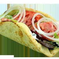 Gyro Sub · 90% lean beef and lamb shoulder served on flat pita bread, then topped with lettuce, tomatoe...
