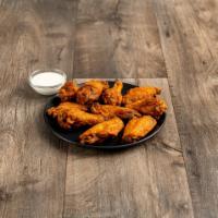 12 Wings · Tossed in the sauce of your choice! Served with кanch or иlue сheese. Wings grilled upon req...