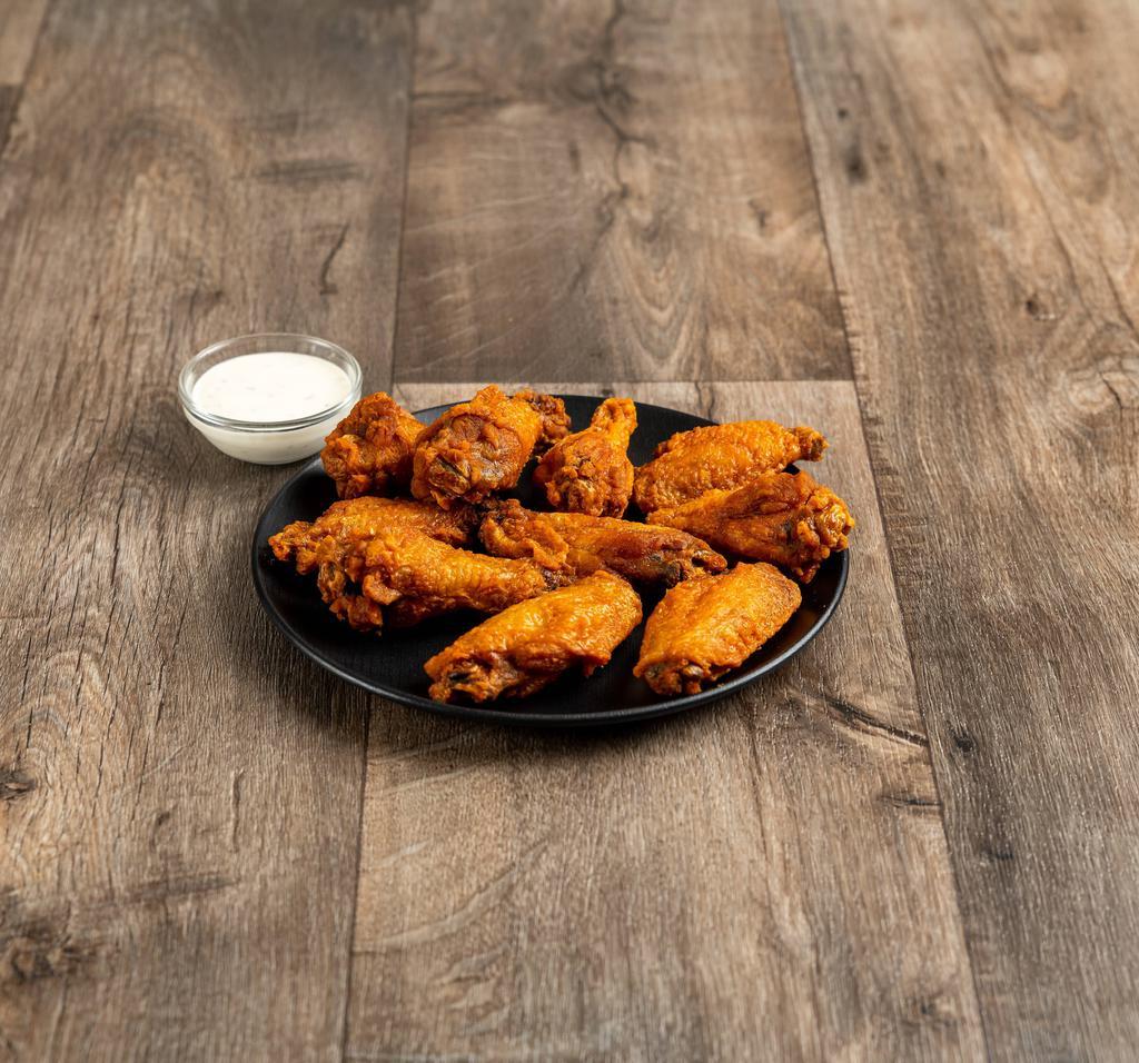 12 Wings · Tossed in the sauce of your choice! Served with кanch or иlue сheese. Wings grilled upon request.