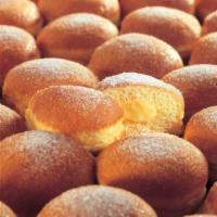 Bomboloni Nutella with Small Homemade Gelato · A soft fluffy fried dough filled with a nutella and rolled in sugar.