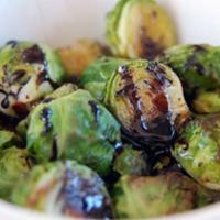 Brussel Sprouts · Brussel sprouts roasted in white wine, topped with a balsamic glaze.