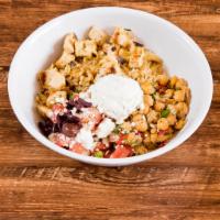 The Greek Goodness Bowl · Brown Rice, Chicken, Greek Salad, Chickpea Salad, and Tzadziki.  Gluten Free and Vegetarian.