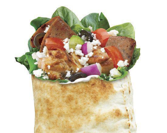 Super Greek · Gyro and chicken souvlaki with spinach, tomatoes, cucumbers, onions, black olives, feta, and tzatziki.