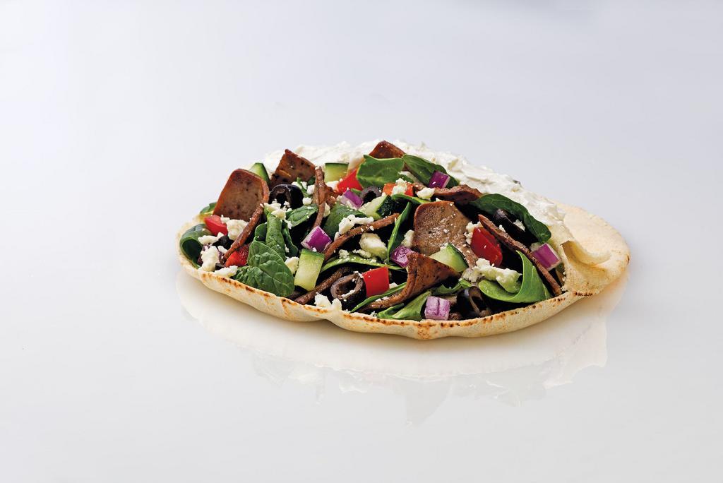 Gyro · Greek seasoned beef and lamb with spinach, tomato, cucumber, black olive, onion, feta, and tzatziki sauce.