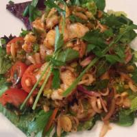 Shrimp Salad · Grilled shrimp tossed with lemongrass and spicy lime sauce, served with fresh greens.