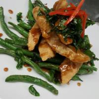 Tamarind Swai · Deep fried with Swai fish and green bean with special tamarind sauce topped with garlic.