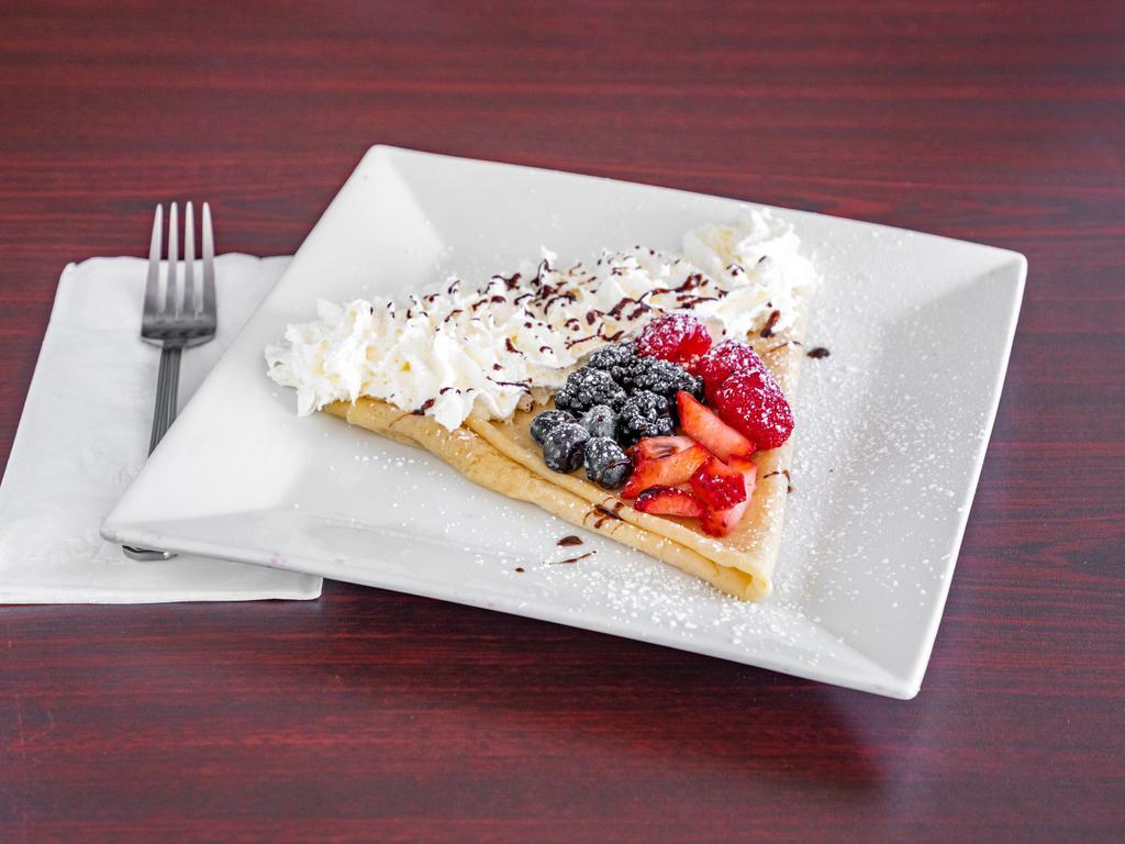 Nutella and Berry Delight Crepe · Nutella, strawberry, blueberry, raspberry and blackberry.