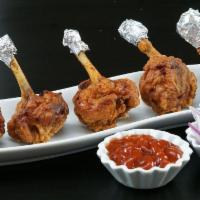Chicken Lollipop (5 Pcs.) · Batter-fried chicken wings. Crispy on the outside and tender and juicy inside.