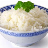 Vegetable Basil Fried Rice · Rice stir-fried with vegetables and fresh basil leaves.