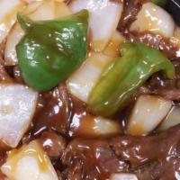 79. Pepper Steak with Onion · Served with steamed white rice. 