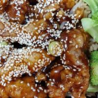 S12. Sesame Chicken · Chicken sauteed in our house special sauce and sprinkled with sesame sauce. Served with stea...