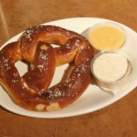 Jumbo Pretzel  · Sweet bread pretzel with sides of queso and brown ale mustard for dipping. 