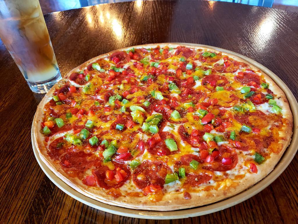 Large Fuzzy's Favorite  · A double layer of pepperoni and mozzarella cheese with classic sauce, fresh red peppers, green peppers, cheddar cheese, and oregano.

