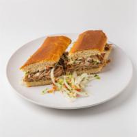 Roast Pork Sandwich · Roasted Pork, Mayo, and Onions. Contains Gluten