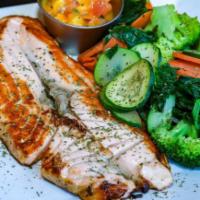 Grilled Salmon · Fresh Norwegian salmon, grilled to perfection, served with steamed vegetables.