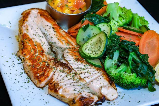Grilled Salmon · Fresh Norwegian salmon, grilled to perfection, served with steamed vegetables.