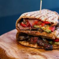 The New Yorker · 6 oz. steak with zucchini, red onions, mozzarella cheese and roasted peppers