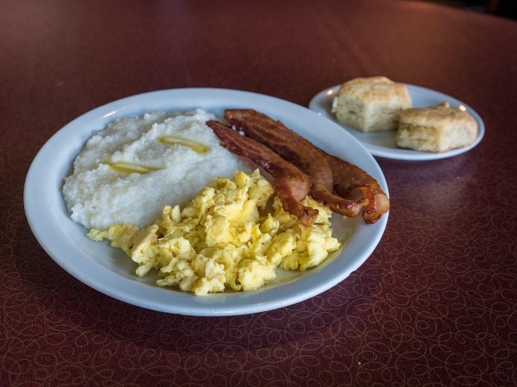 Bacon and Eggs · 2 eggs any style, with side of bacon, choice of hash browns, grits, or rice and choice of homemade biscuits, English muffin or wheat toast.