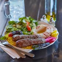 Kafta Kabob Plate · Ground beef seasoned with our special spices, onions and chopped parsley, skewered and grill...