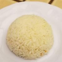 Basmati Rice · Steamed rice prepared fresh daily.