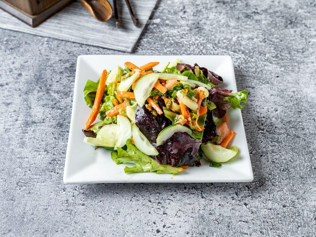 Green Salad · Mixed greens, carrot, cucumber, scallion, in ginger dressing