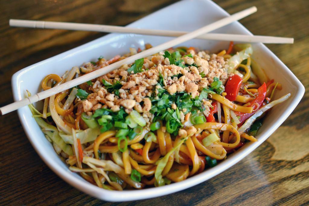 Lo Mein Stir-Fry · Egg noodles, cabbage, onion, pepper, carrot, yellow squash, cilantro, scallion, peanut and soy dressing.