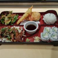 Chicken Teriyaki Bento · Served with salad, 4 pieces California Roll, steamed rice, and mixed tempura.
