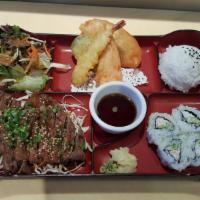 Beef Teriyaki Bento · Served with salad, 4 pieces California Roll, steamed rice, and mixed tempura.