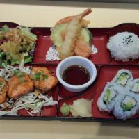 Salmon Teriyaki Bento · Served with salad, 4 pieces California Roll, steamed rice, and mixed tempura.